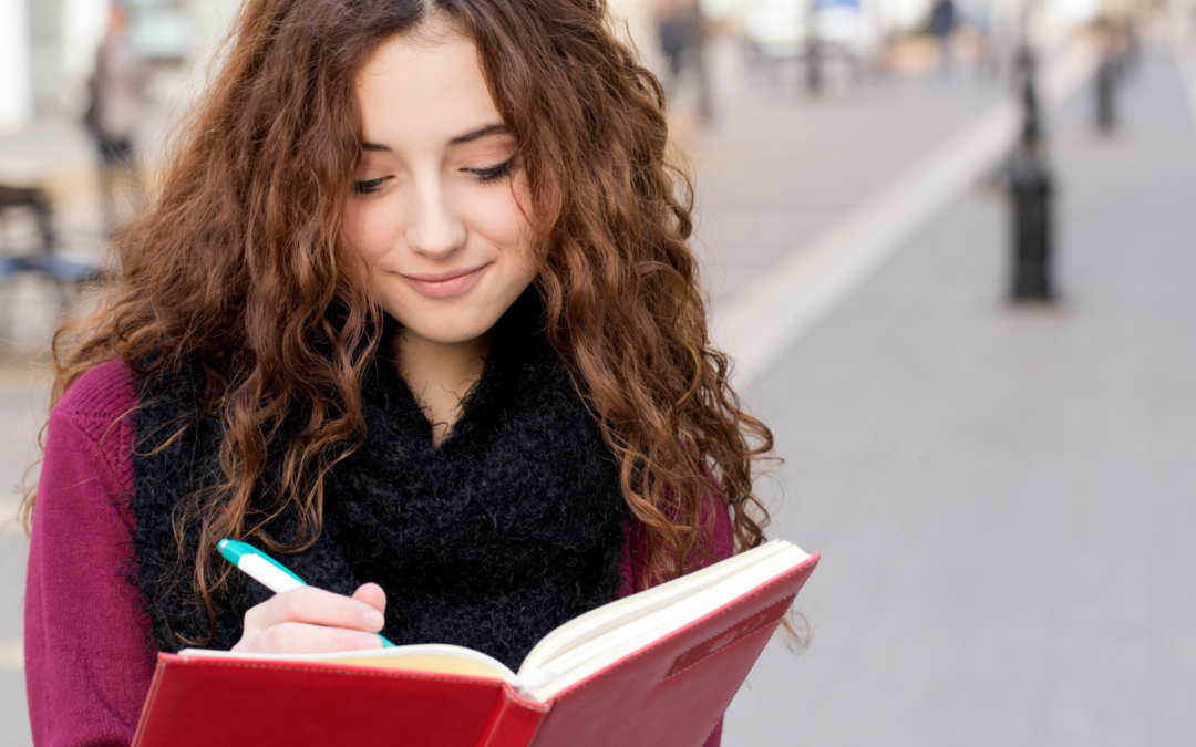 Catholic homeschool student writing