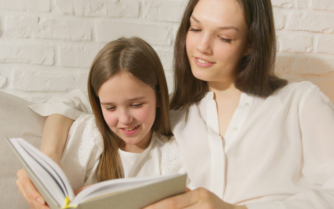 mom reading to daughter