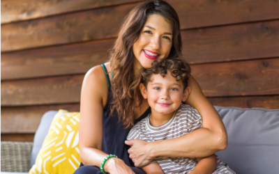 Mom and child smiling at home