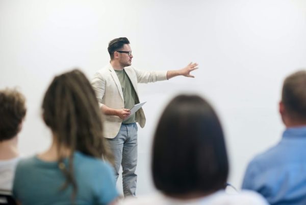 a teacher giving his class