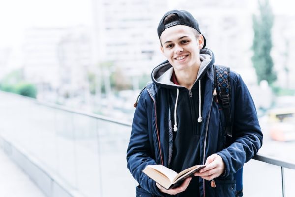 a guy reading a book