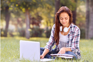 a woman using her notebook