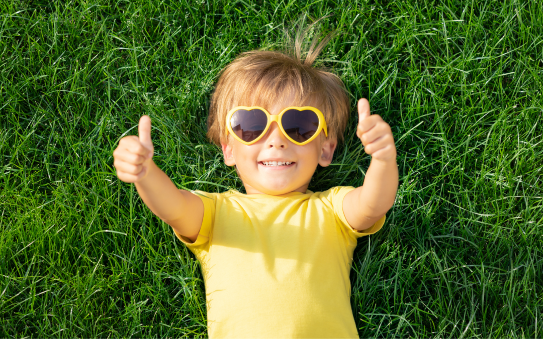 homeschooled child giving thumbs up