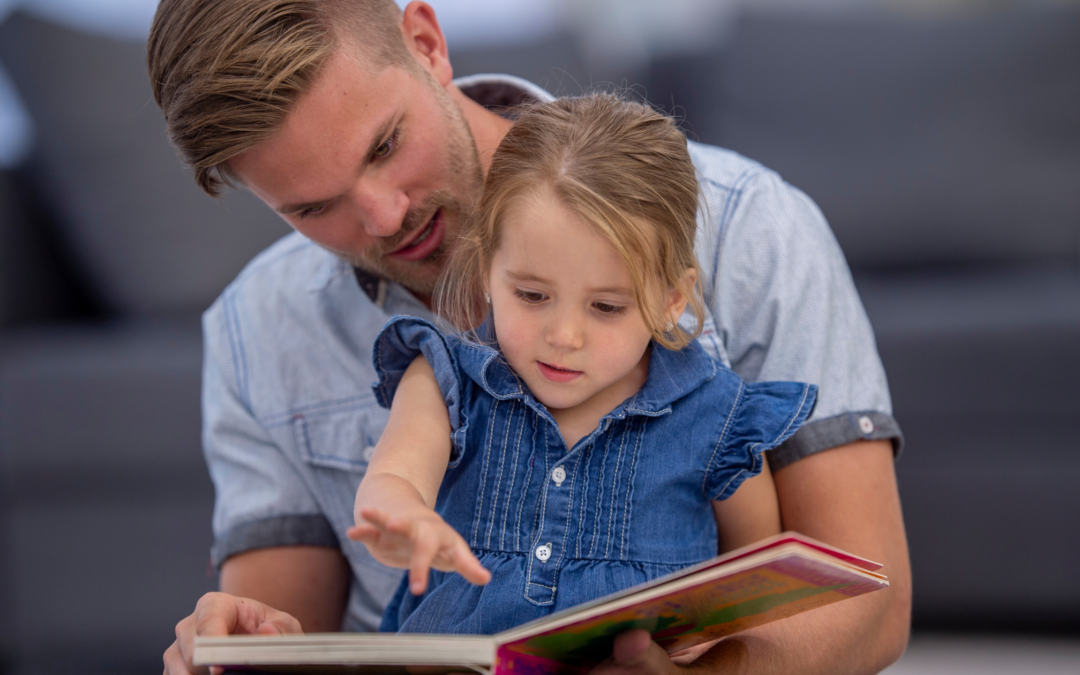 dad reads aloud to child