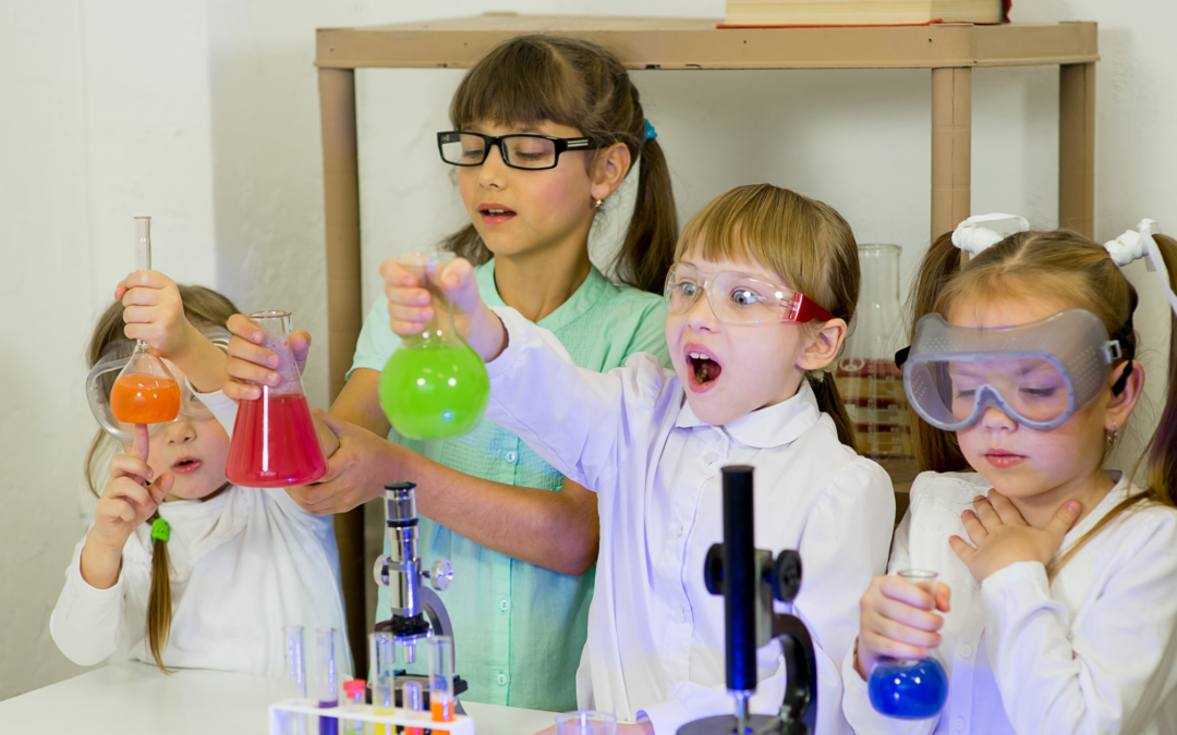 homeschool kids doing science experiement