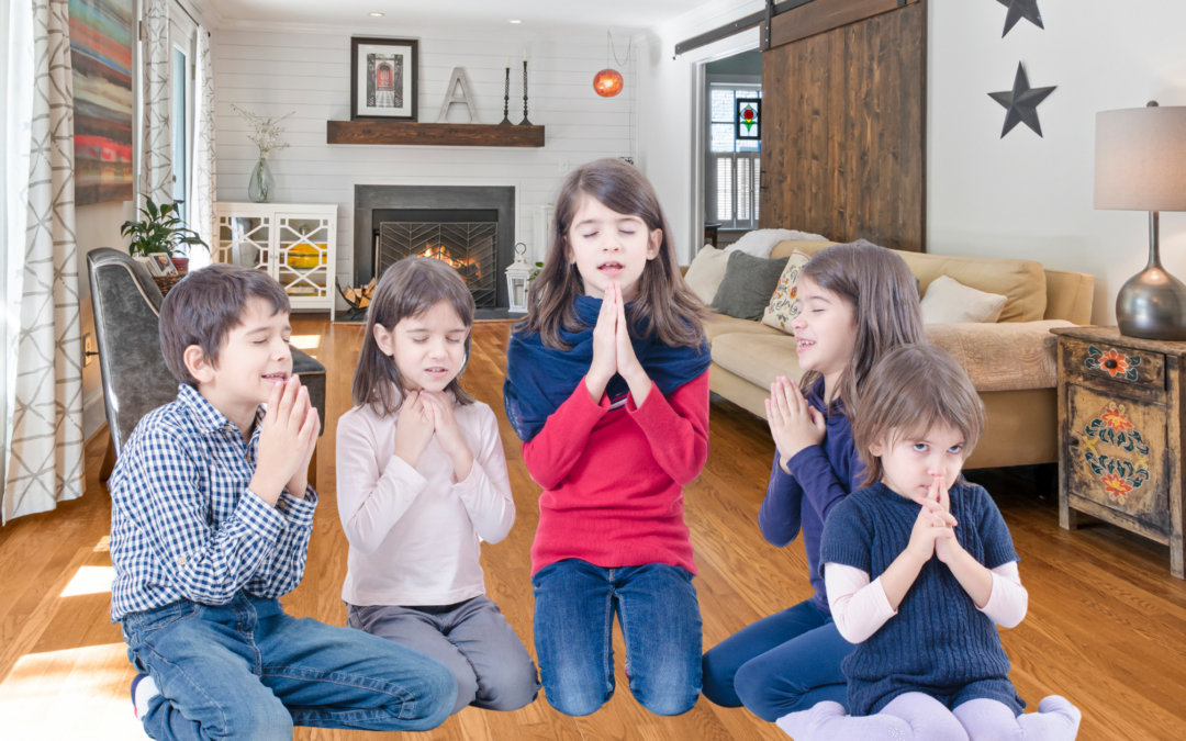 catholic homeschool family praying