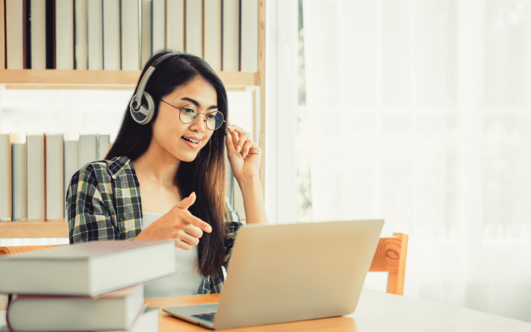 Catholic homeschool teen on a laptop