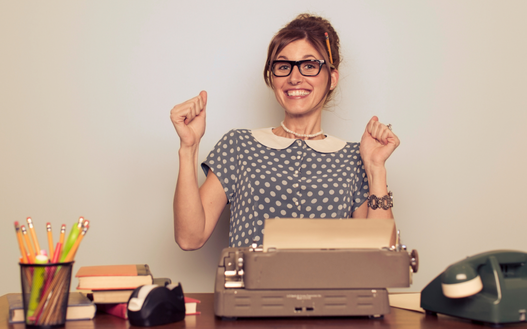 catholic homeschool mom at typewriter