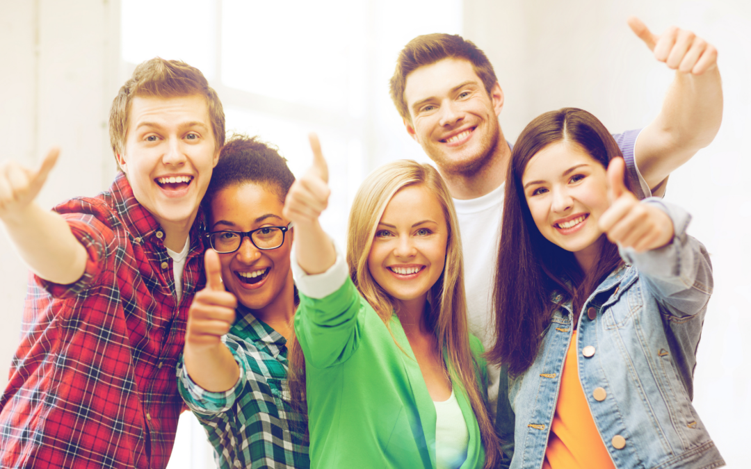 Catholic homeschool teens giving the thumbs up