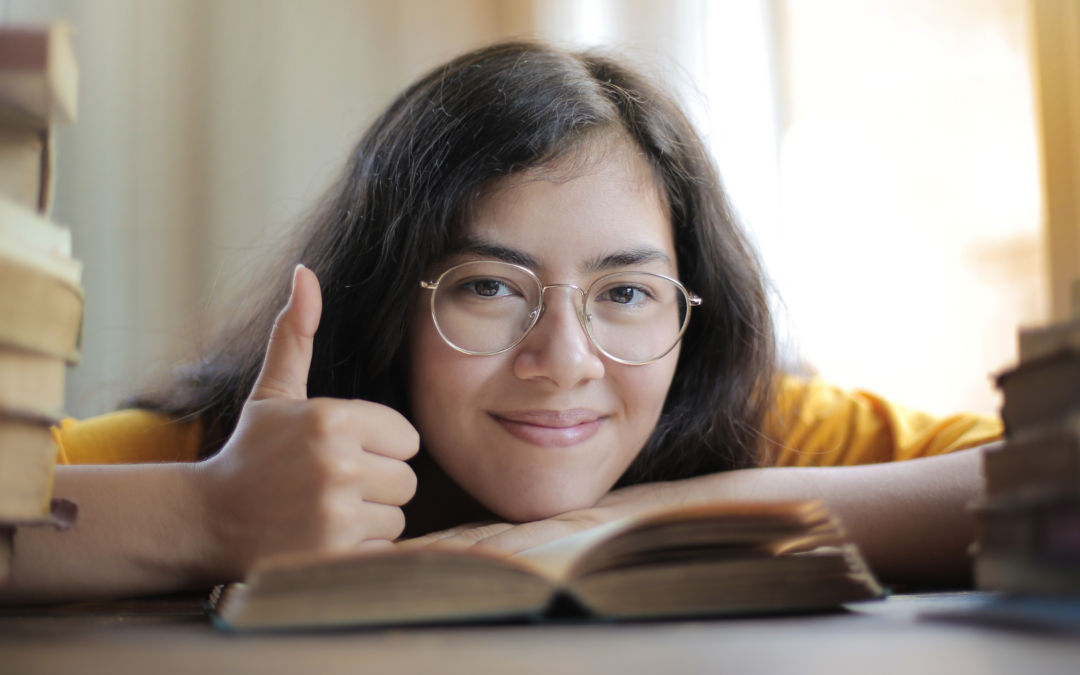 catholic homeschool teen giving a thumbs up