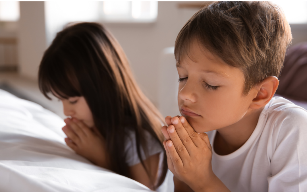 Catholic homeschool children praying at bedtime
