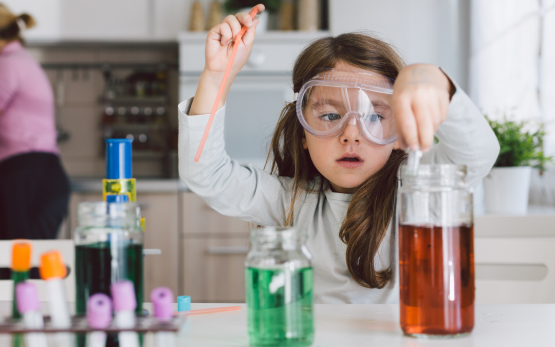 grade school homeschool child doing sceince esperiment