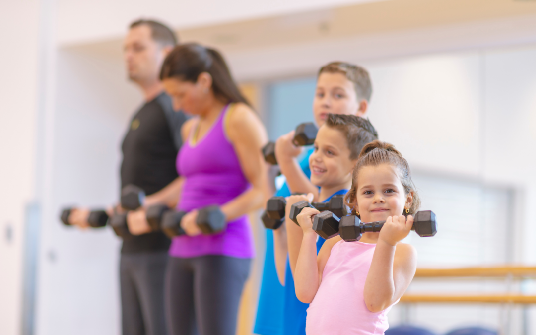 catholic homeschool family doing weight training together at home