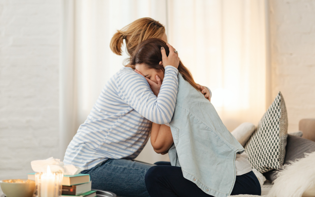 mother comforting a child after traumatic event.