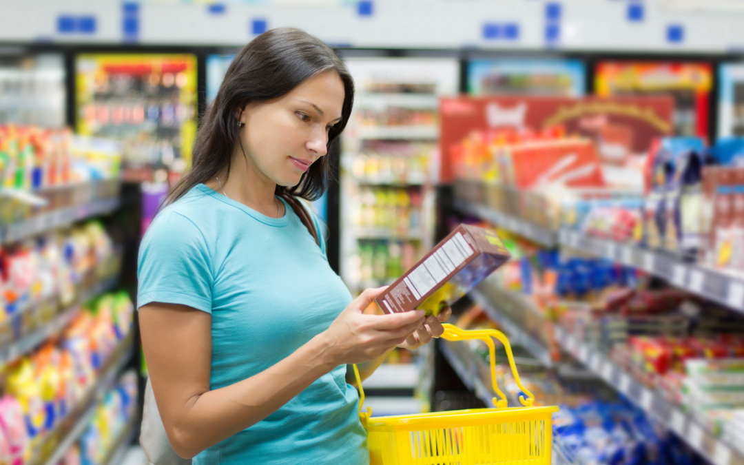 catholic homeschool mom reading food labels in the grocery store