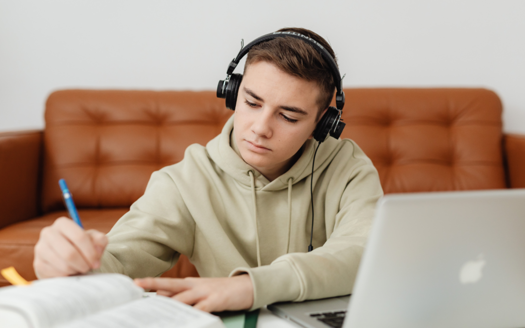 catholic homeschool teen boy doing homework